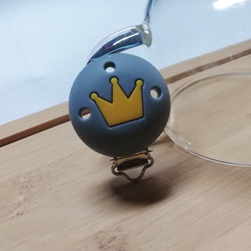 Crown pacifier clip