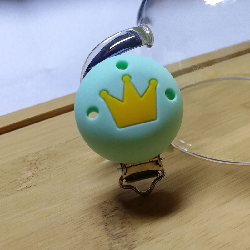 Crown pacifier clip